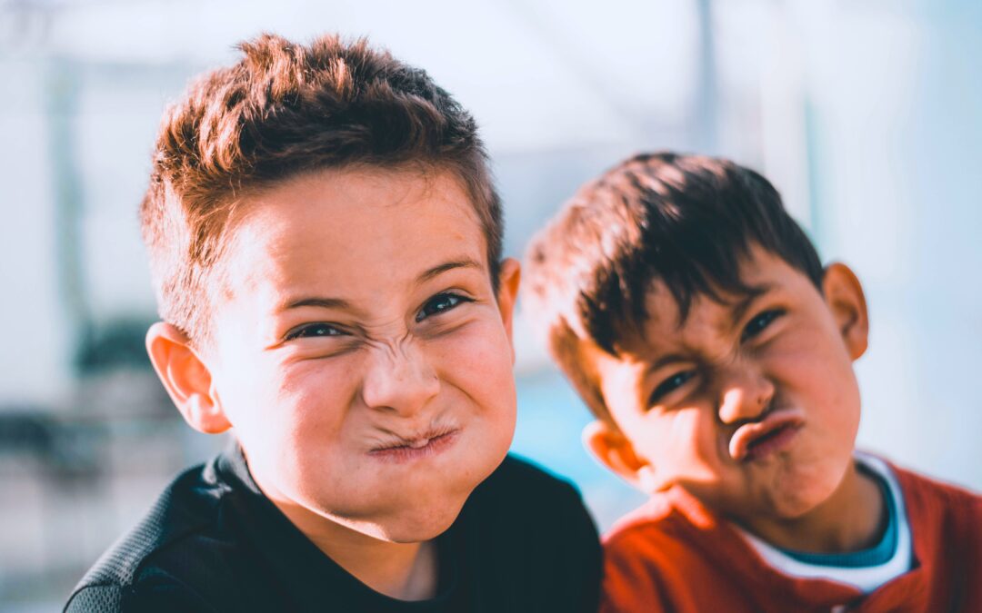 two kids making funny faces